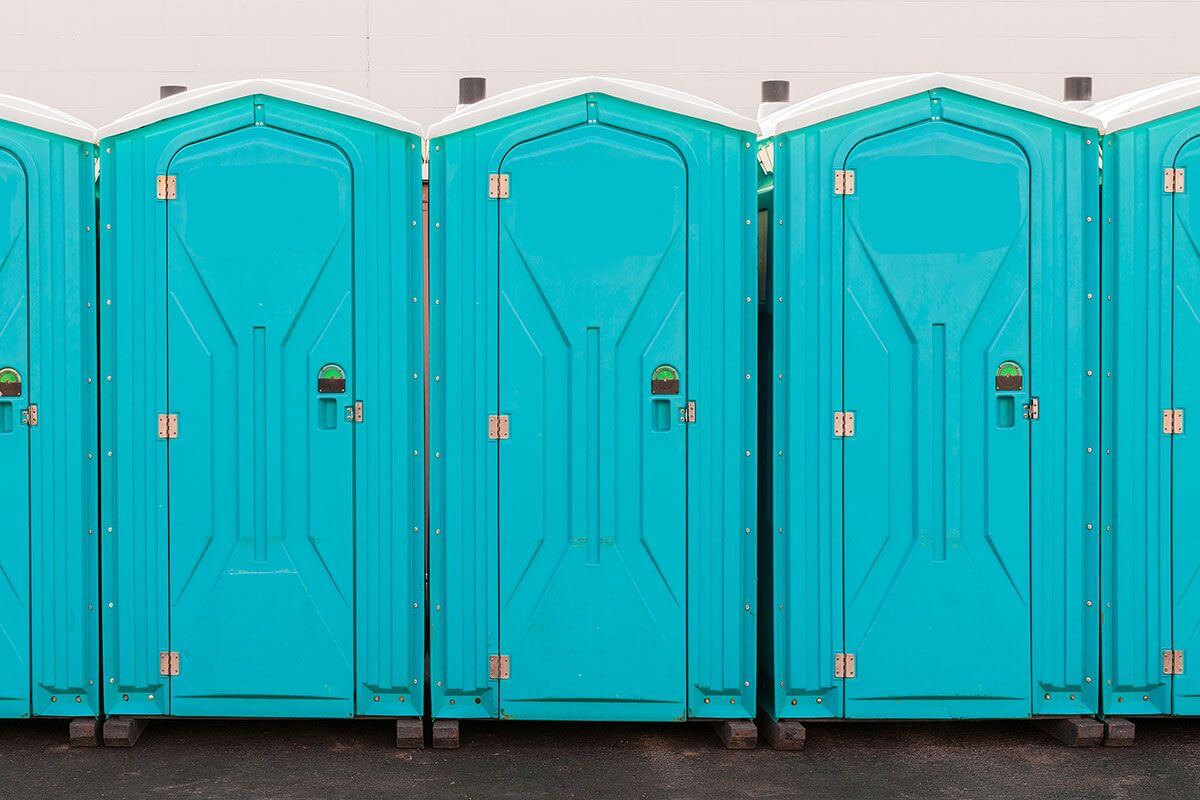Industrial portable restroom units at a plant in Taunton, Massachusetts
